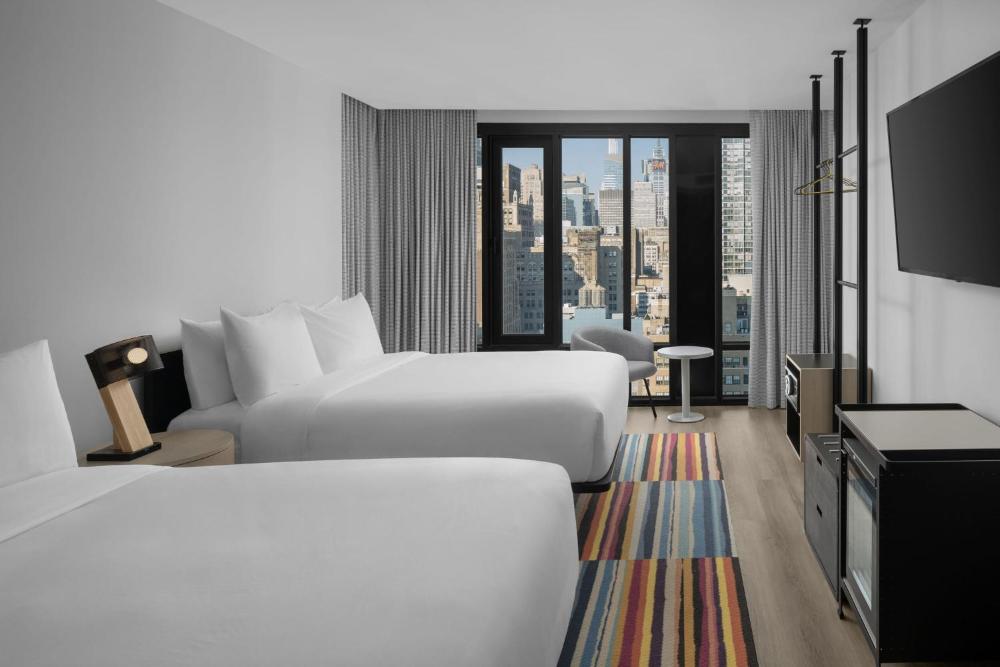 Queen Room with Two Queen Beds and City View interior